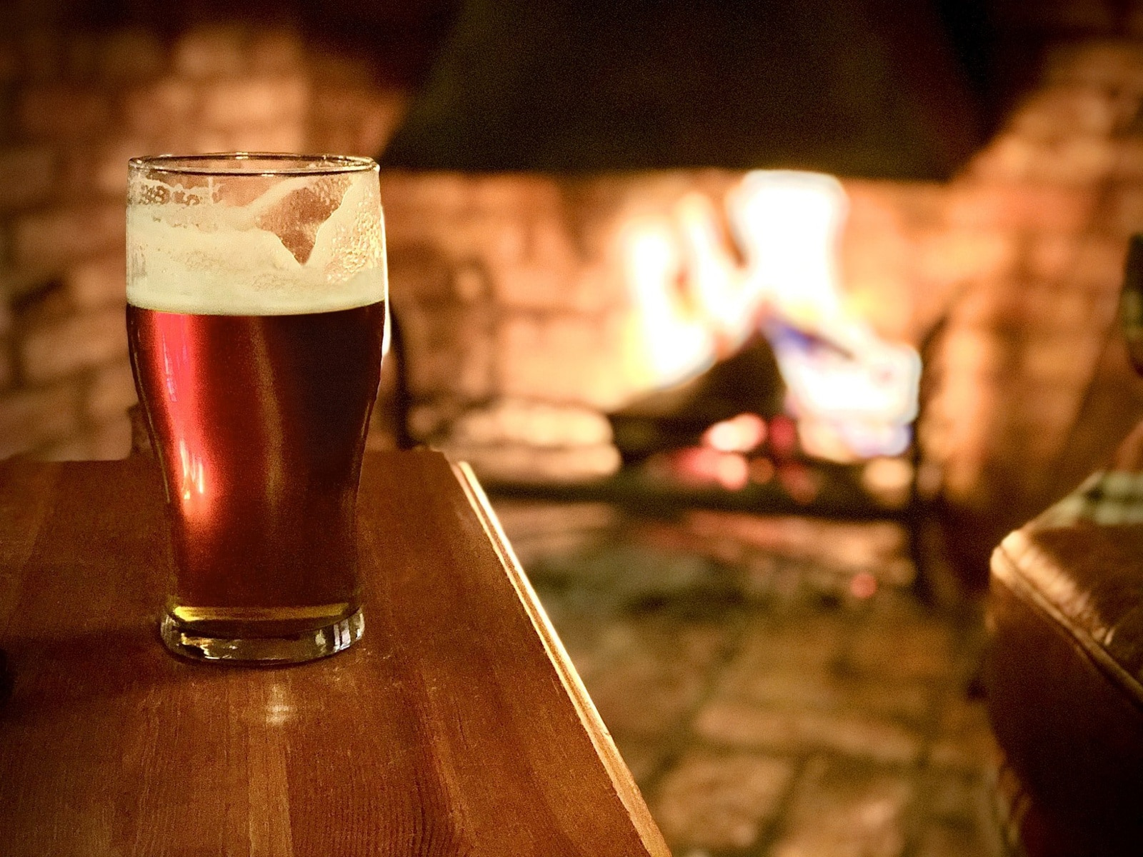 Beer by fireplace