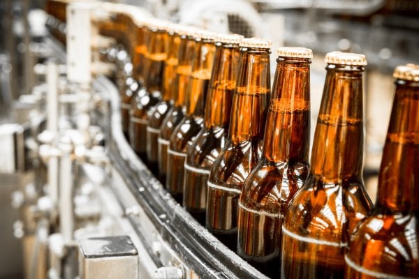 depositphotos_46194373-stock-photo-beer-bottles-on-the-conveyor